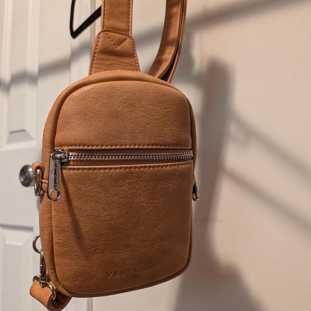Tan leather crossbody bag with adjustable strap